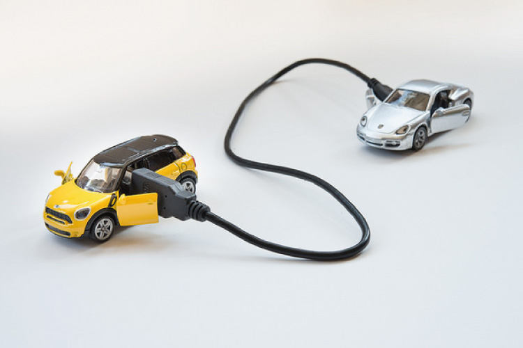 Mini connected to a Porsche via a USB cable
